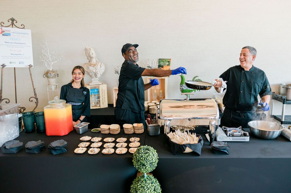 cooks making pasta and laughing, Event Photography, Melbourne, FL