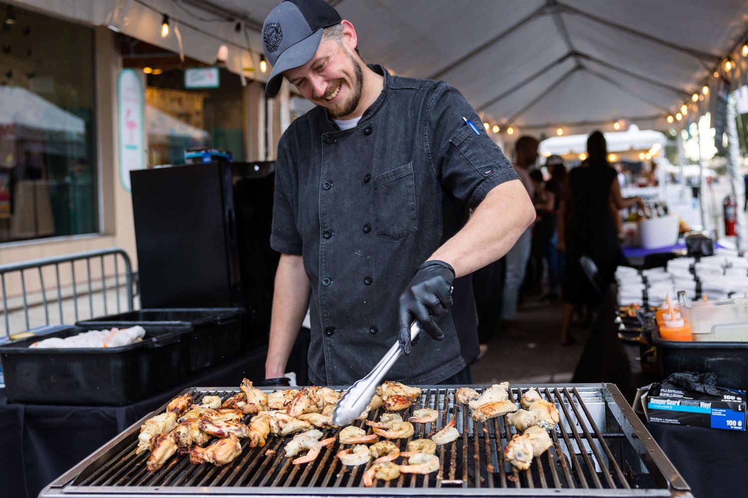 cook grilling shrimp and chicken, Event Photography, Melbourne, FL