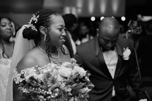 Black and white photo of joyful moments during wedding celebration.