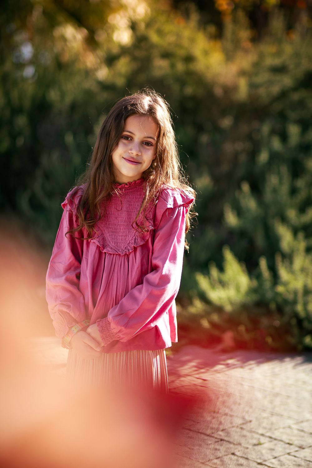 Portrait of a smiling girl in nature