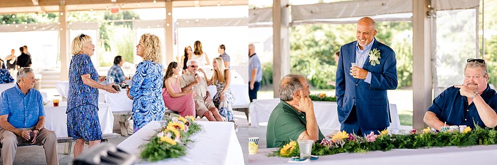 Wedding reception guests dancing and celebrating under wooden pavilion.