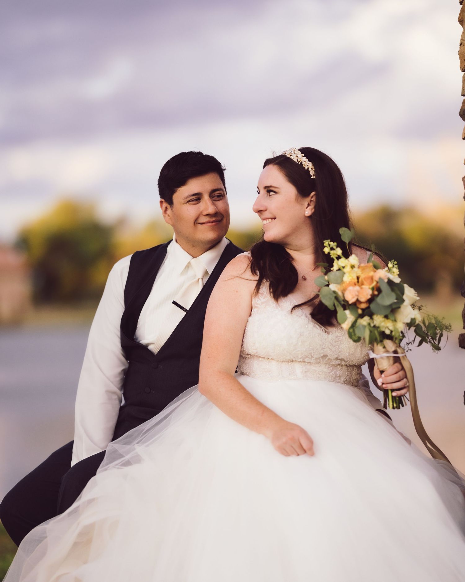 Bride and Groom in front of lake