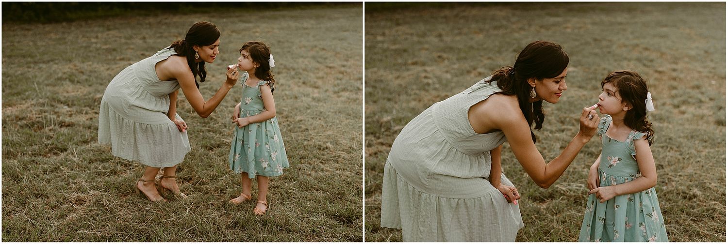 Sweet moment between parent and child in matching mint and grey dresses outdoors.