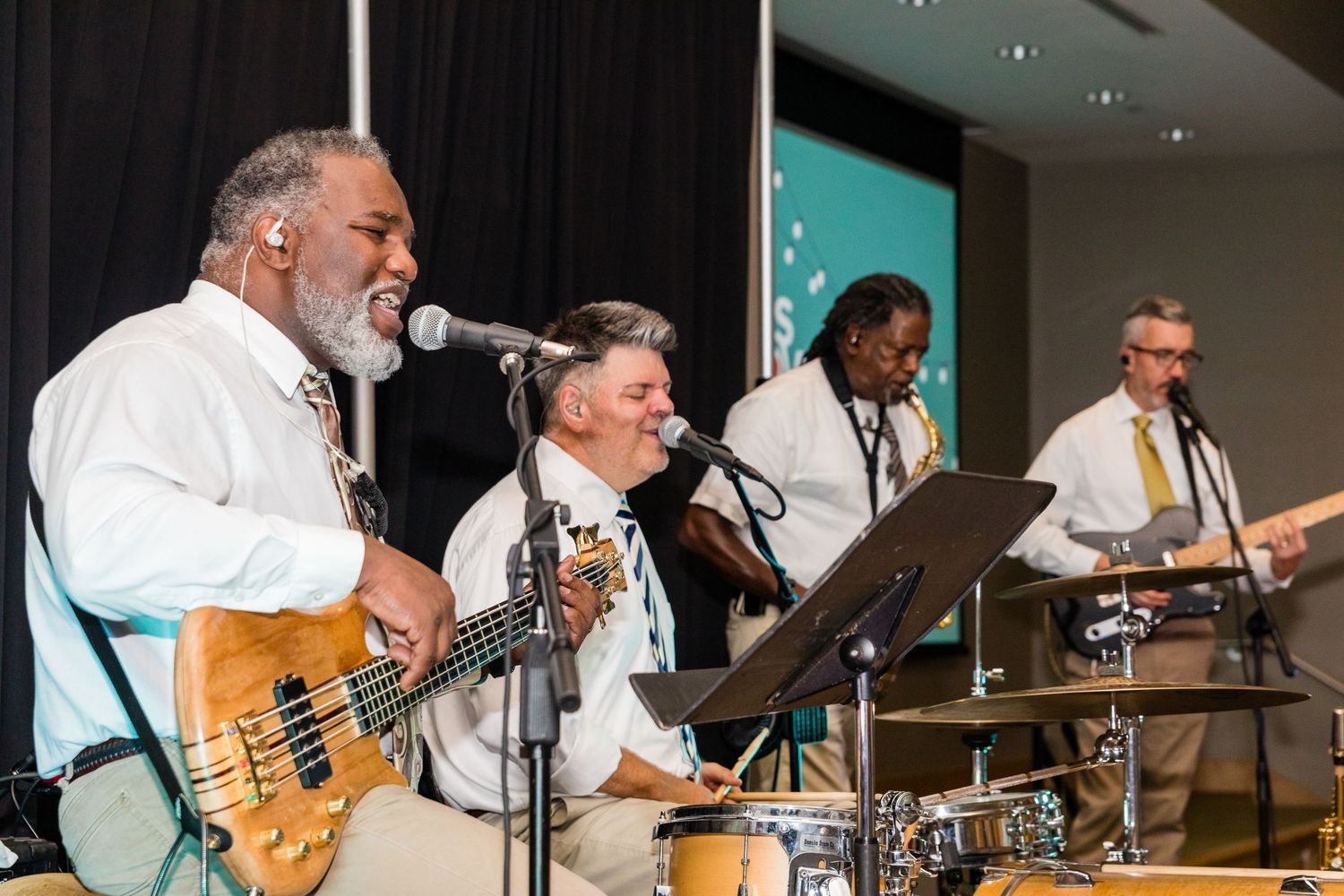 Family photo of musicians playing together at event