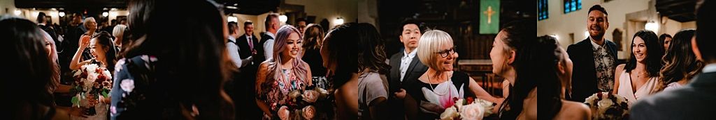 Reception celebration with dancing and festivities in a dimly lit venue.