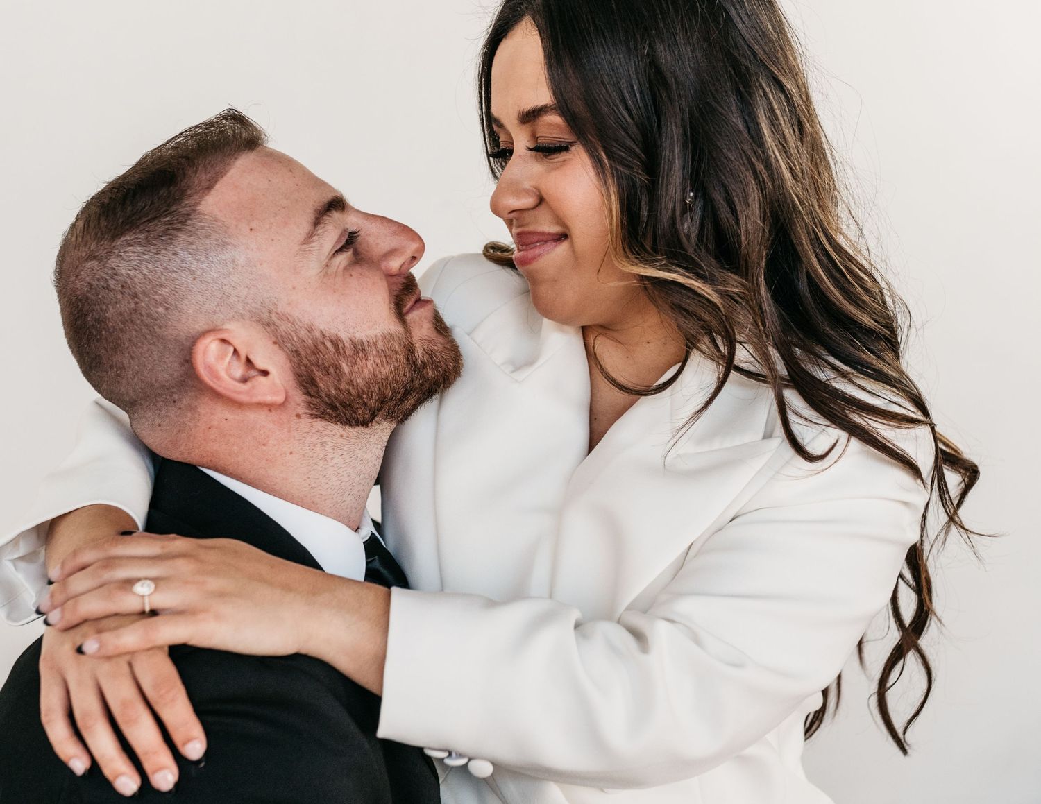Engaged man and woman in Houston photography studio.