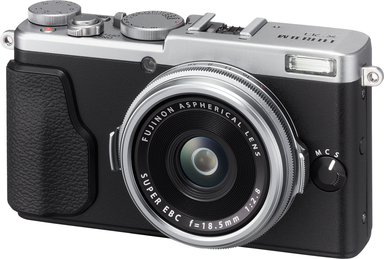 Silver and black Fujifilm X-E4 digital camera with prime lens.