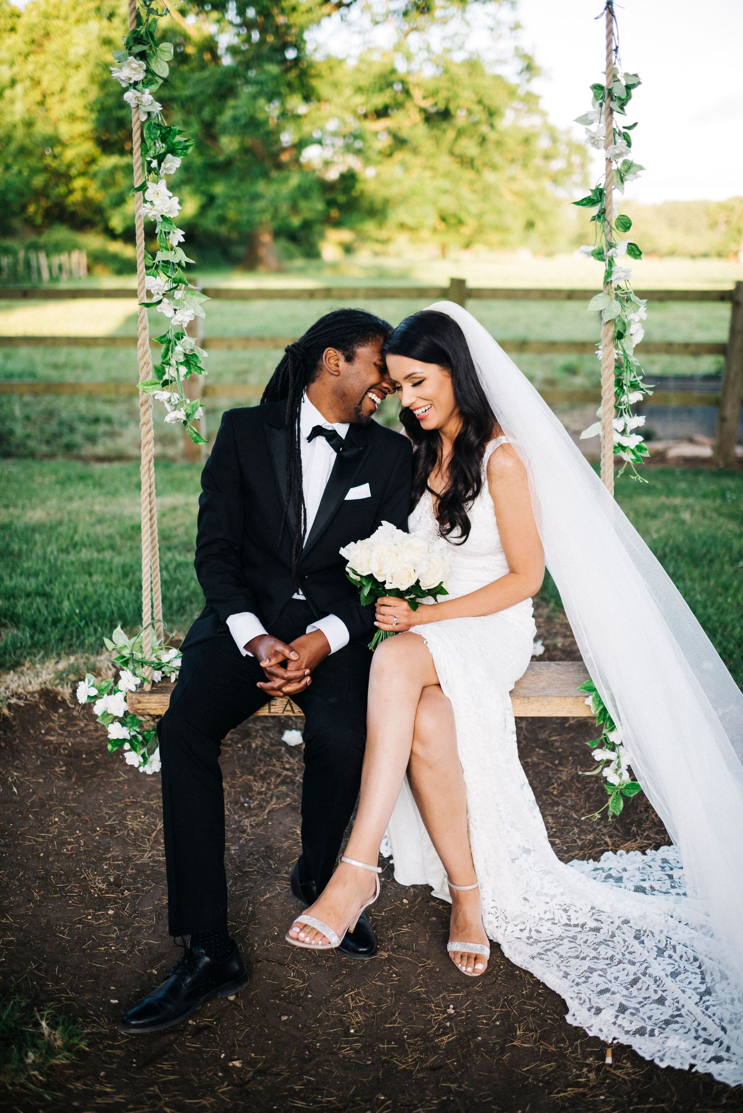 Cotswolds wedding, cotswolds wedding photographer, bride and groom on a swing, grace loves lace bride, black tie wedding