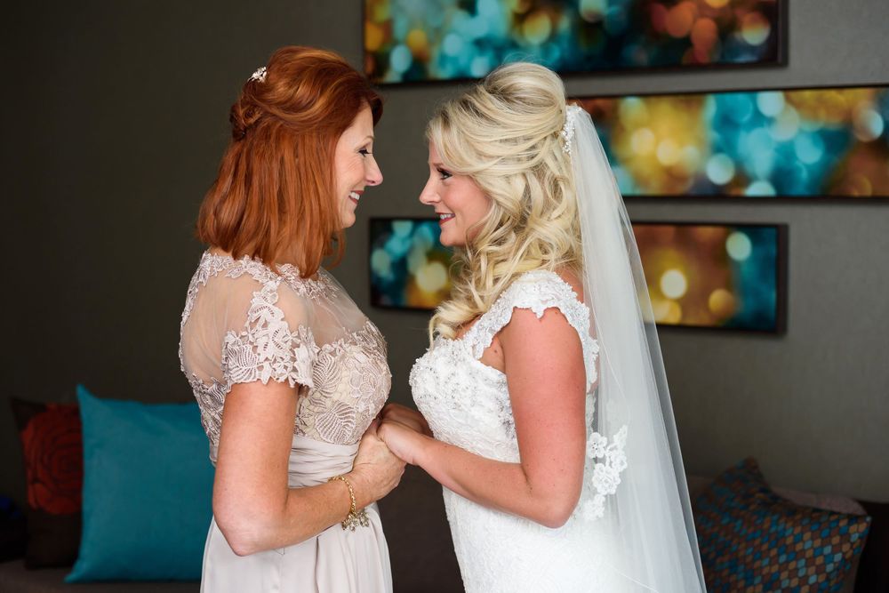 Mother and bride share moment before wedding ceremony in Cleveland, Ohio.
