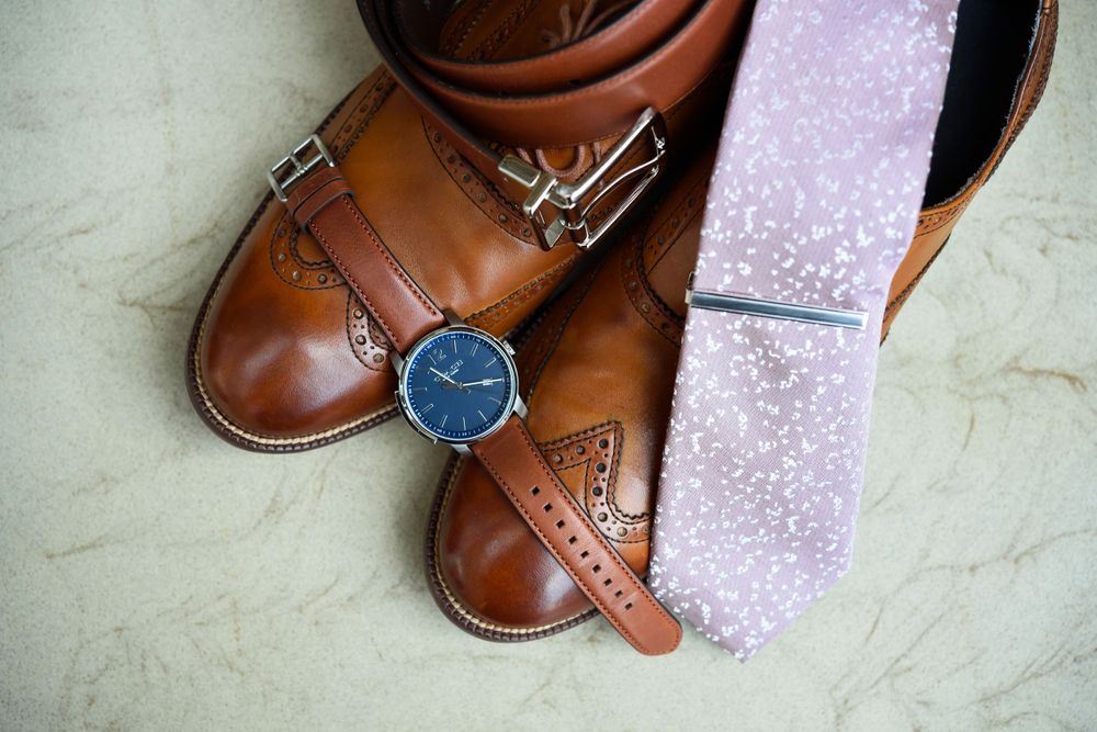 Groom's watch, tie, shies and watch on wedding day in Cleveland, Ohio.