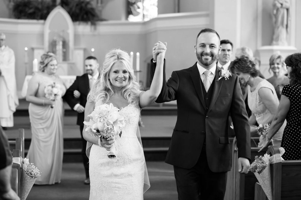Bride and groom just married at Saint Mary Parish in Elyria, Ohio.