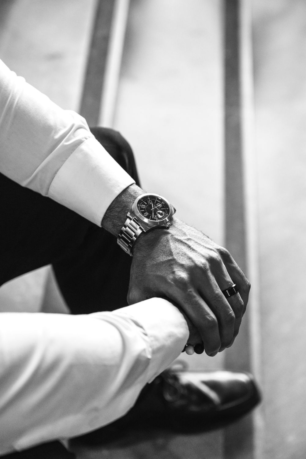Editorial inspired wedding photography showing the grooms watch