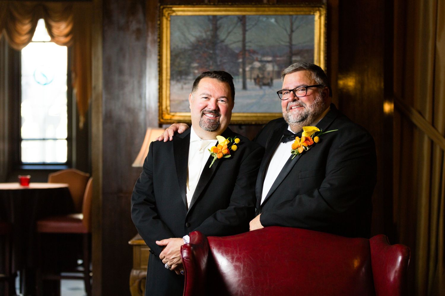 Gay wedding filled with flowers at Columbia Club for owner of McNamara.