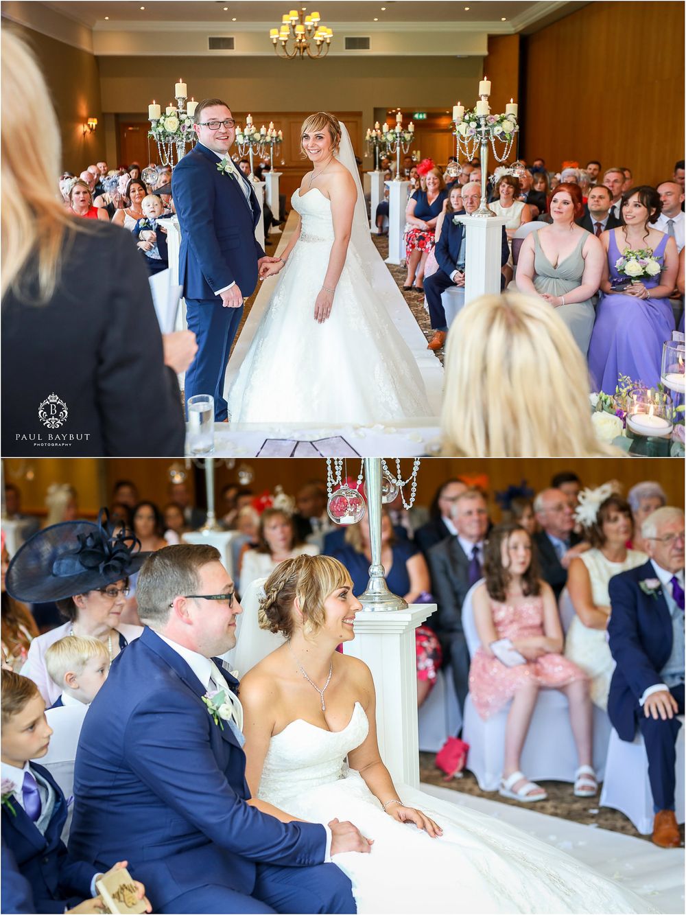 Indoor wedding ceremony with elegant decor, white and purple color scheme, and candelabras along the aisle.