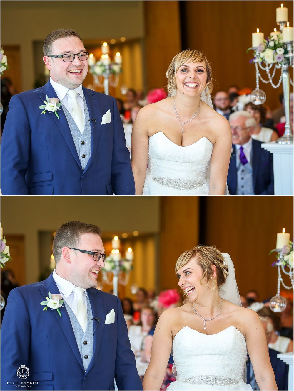 Elegant indoor wedding ceremony with romantic candlelit decor and white floral arrangements.