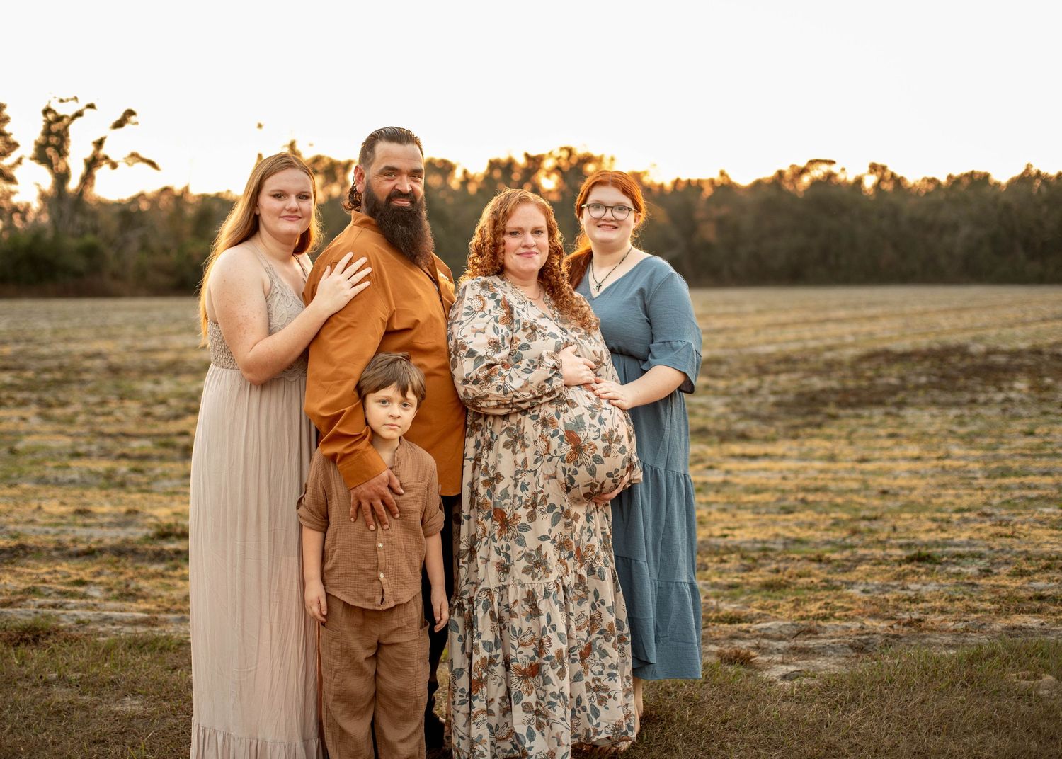 Self portrait of photographer with family in our back yard in Live Oak, FL. Photographer introduction.