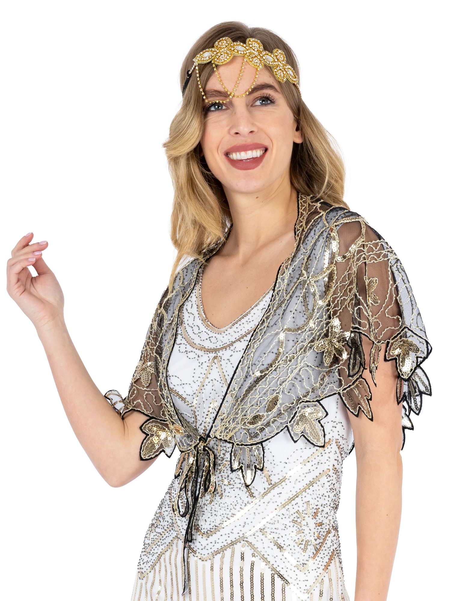 Blonde hair femme model in a 1920s style sparkling sequinned flapper dress in a photography studio in Hove