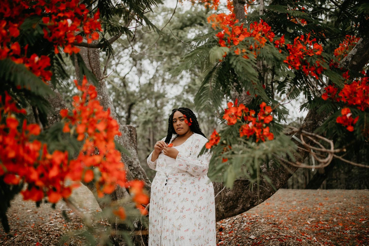 Woman standing amongst Ixora chinensis in Wacol Brisbane
