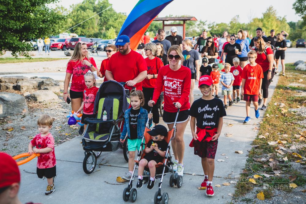 Event photograph of start of a walk for an organization.