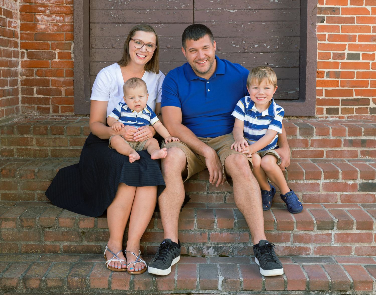 Family sitting together on brick steps. Wrightstown NJ Family Photograher