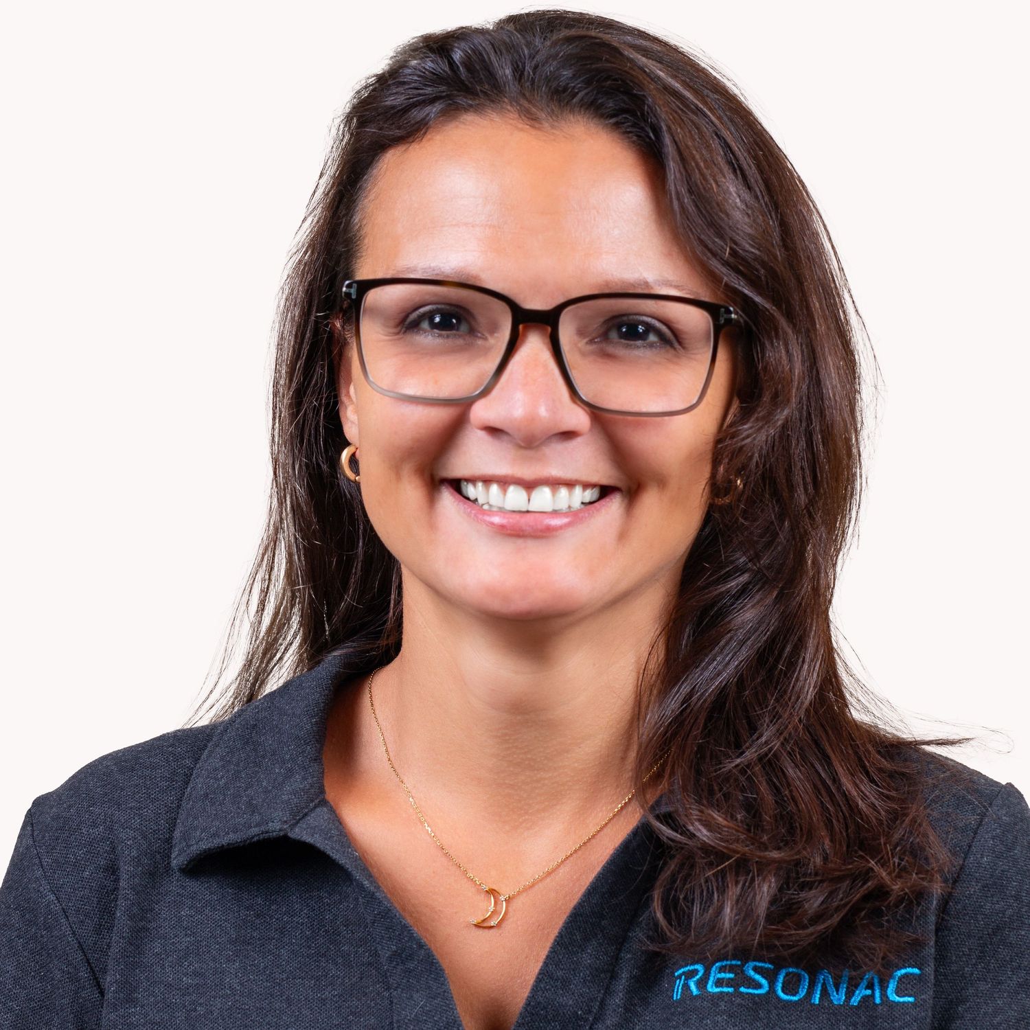 Corporate headshots showing different poses in professional attire against white backdrop.