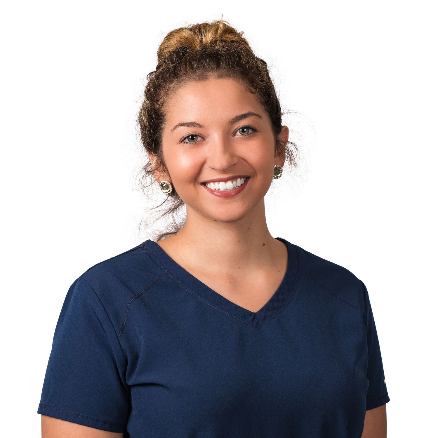 Professional headshots showing warm expressions in navy blue tops against white background.