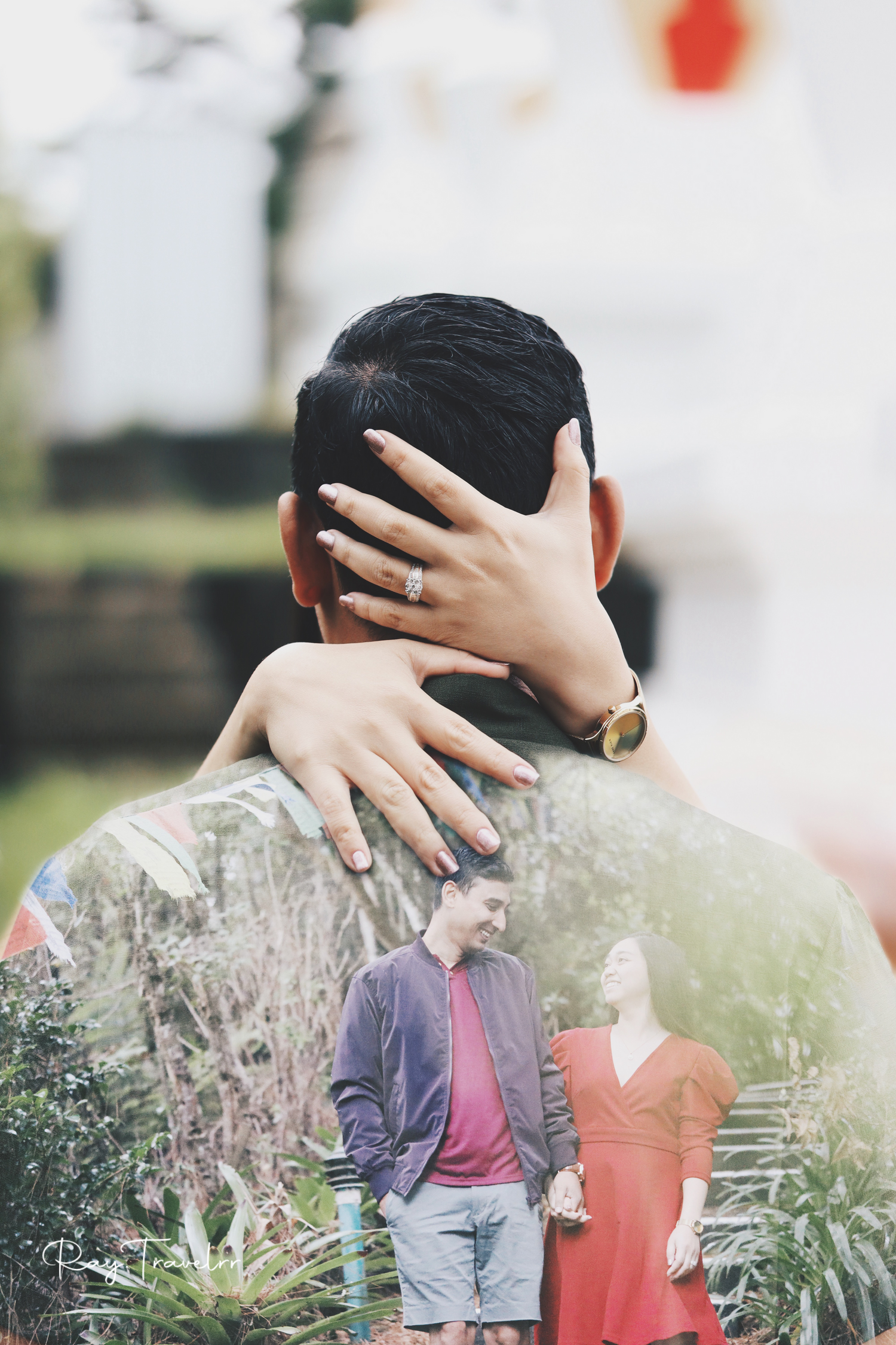 Artistic engagement photo with hands and rings against blurred backdrop.