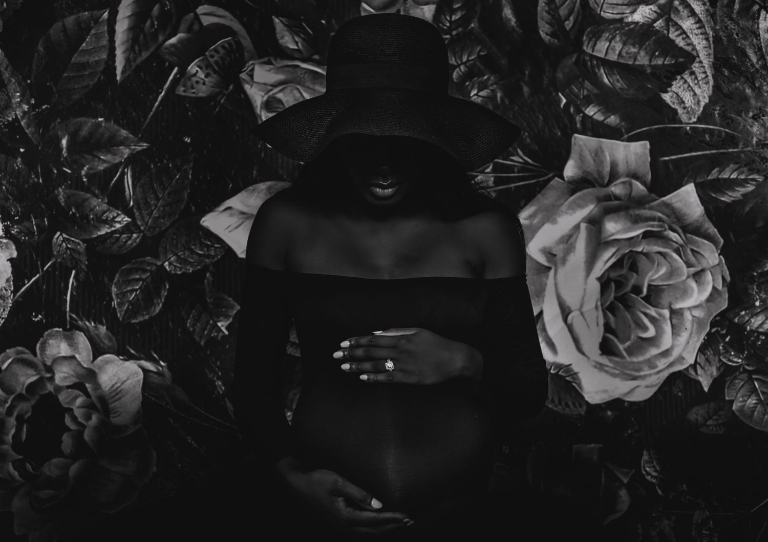 Dark and moody floral arrangement details in black and white.