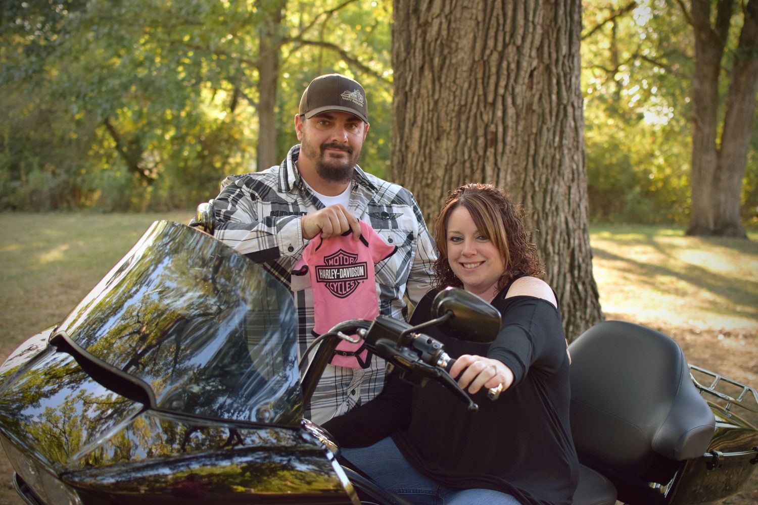 couple maternity engaged pink onesie biker baby photo