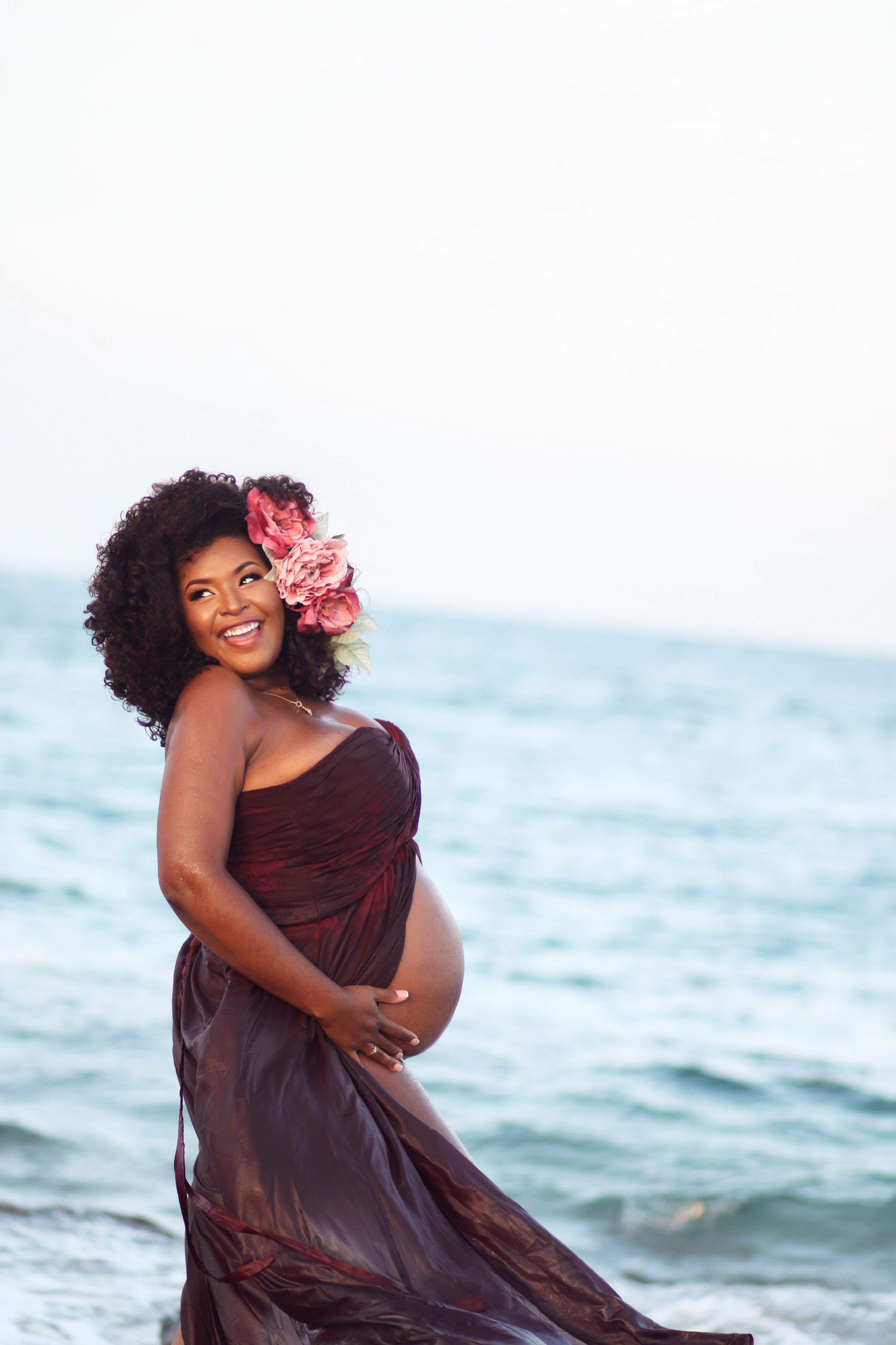 beautiful black Pregnant woman in the water
