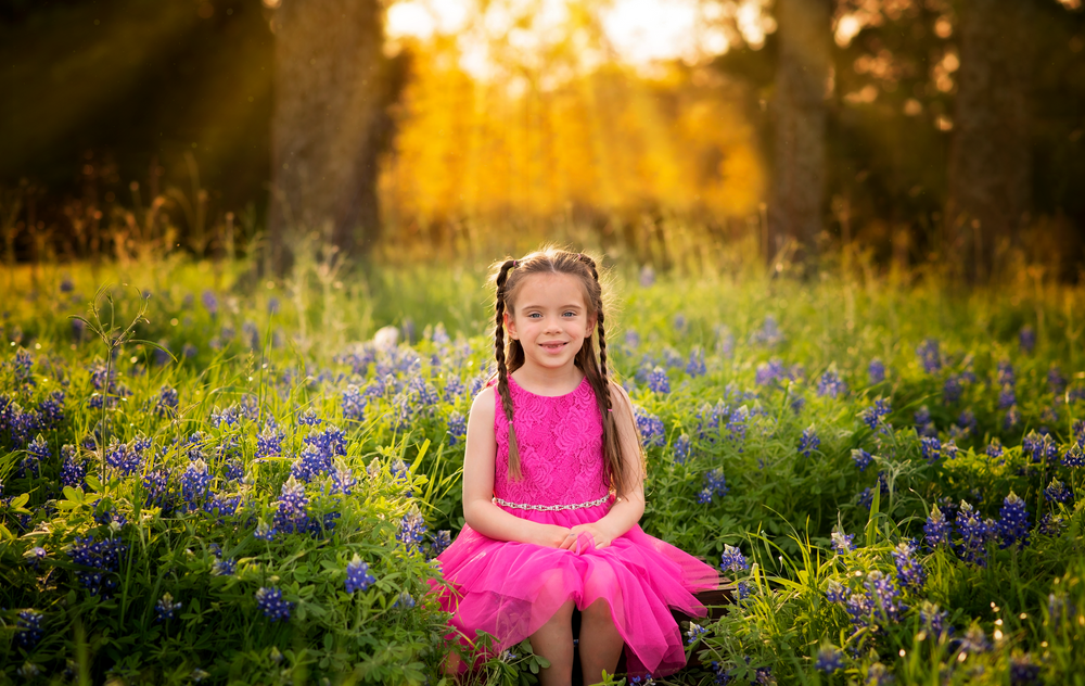 Bluebonnets at golden hour children's photography in Rockwall, Texas by Alicia Wilson