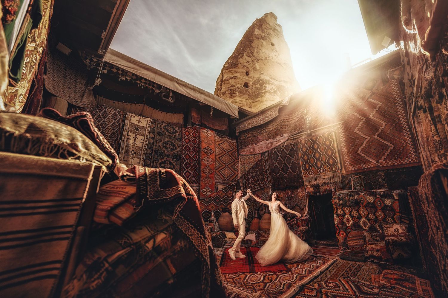 Moody interior shots of ancient stone architecture with dramatic lighting and archways.