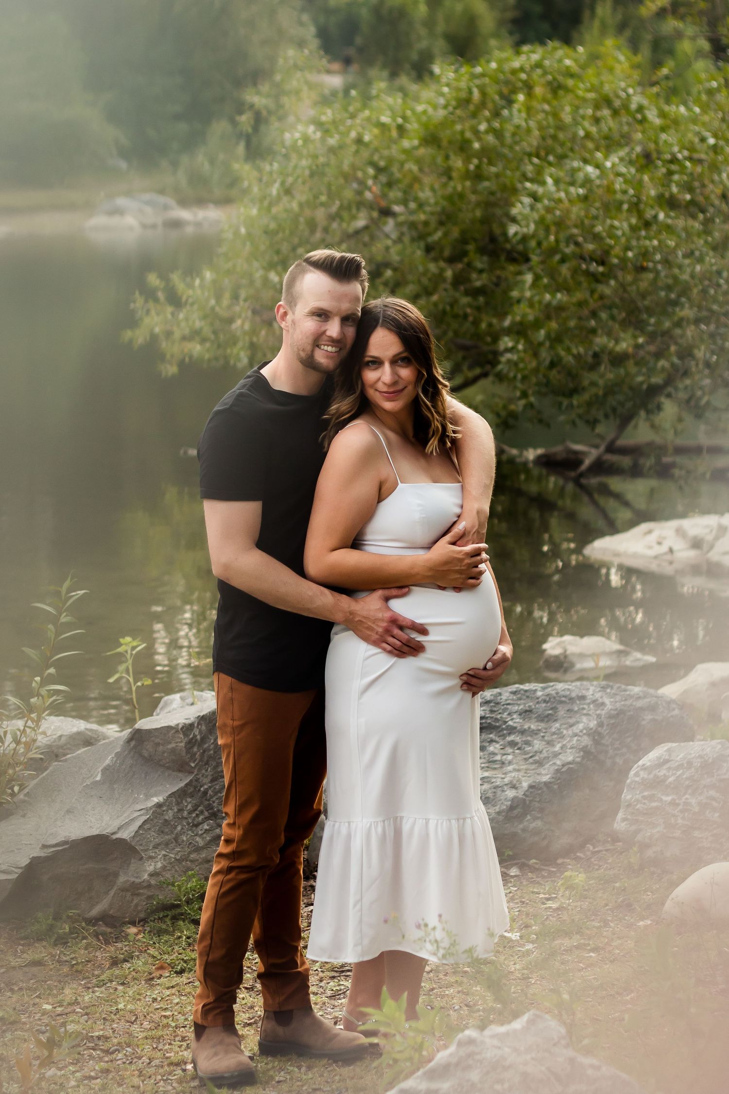 Lifestyle Photography: Beautiful summer maternity photos at Prince's Island Park in Calgary Alberta.