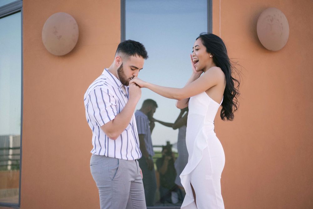 Boyfriend kissing hand of girl mcallen wedding photographer