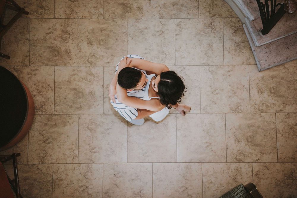 Bird view picture of a couple cuddling each other Edinburg texas