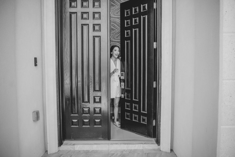 Getting ready of a brode opening the door of her house Edinburg, Texas.