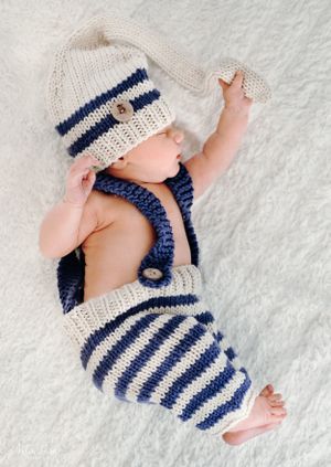 Baby mit Zipfelmütze