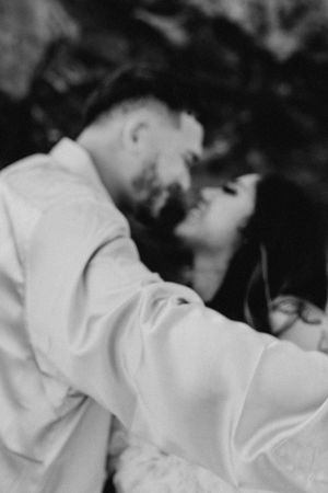 Intimate black and white portraits showing tender moments during a maternity shoot.