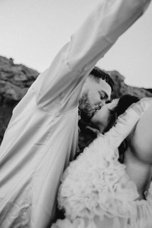 Artistic close-up shots of a maternity photo session in dreamy black and white.