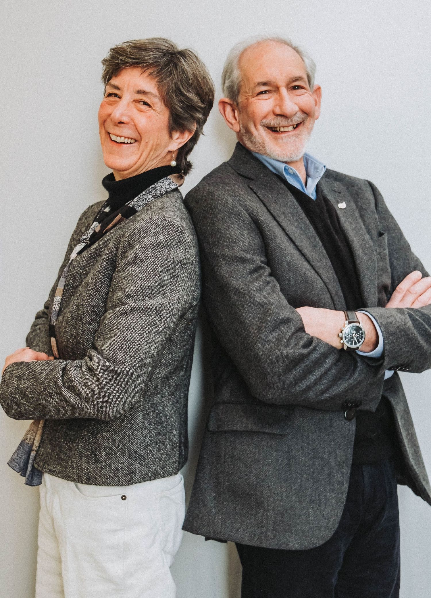 Two business partners pose for headshot and branding photos in Brunswick, Maine.