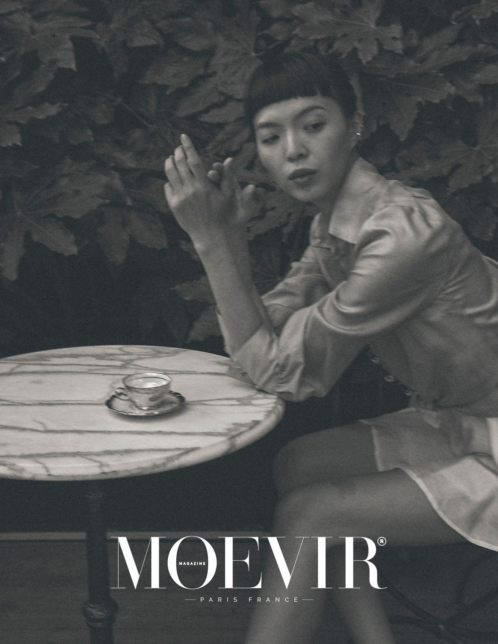 Contemporary fashion portrait showcasing bold styling and confident expression.