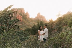 Romantic Sedona engagement session captures the beauty of the couple in awe of the mountains and sunset, by Sergio Galva