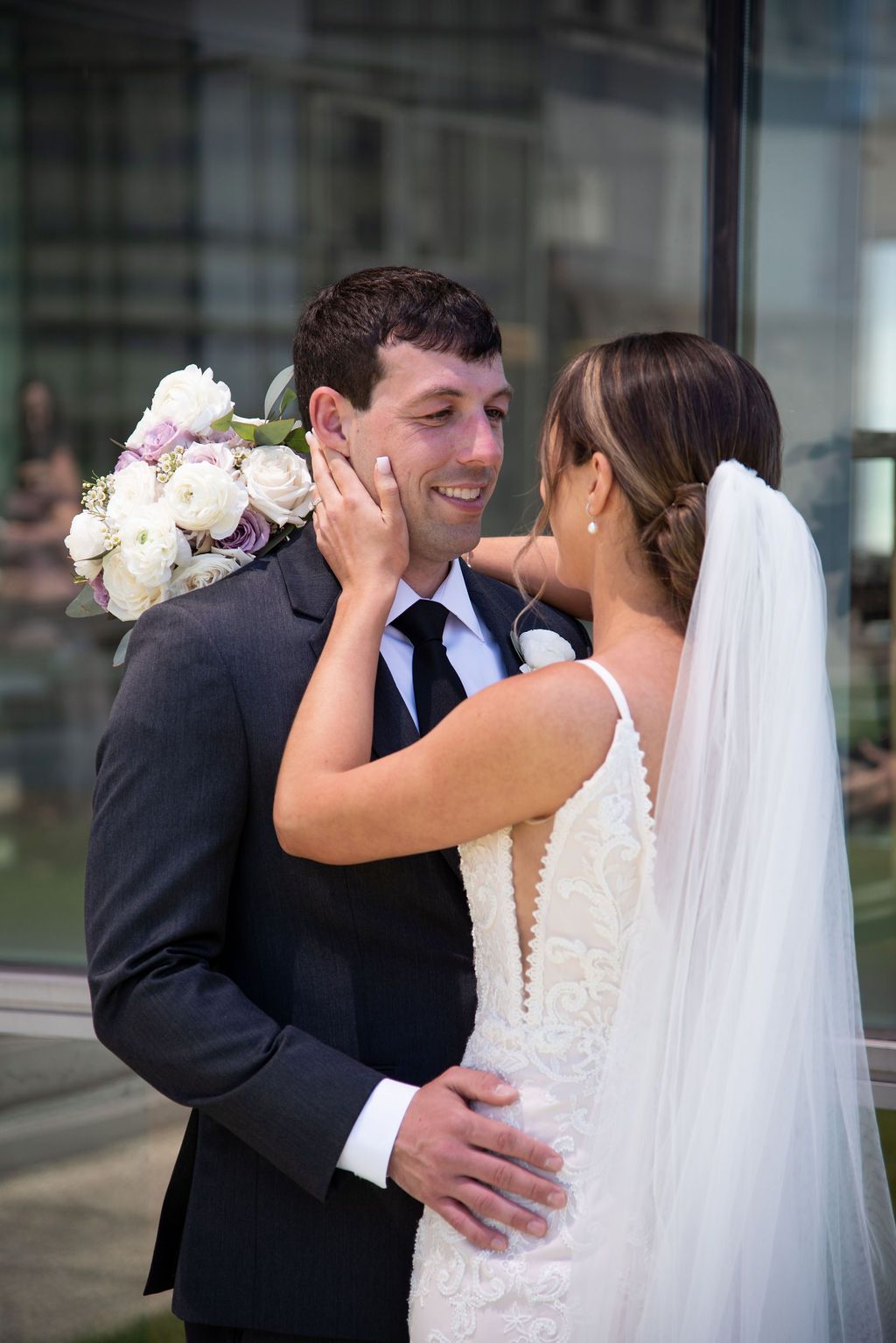 Groom Smiling at Bride on Rooftop