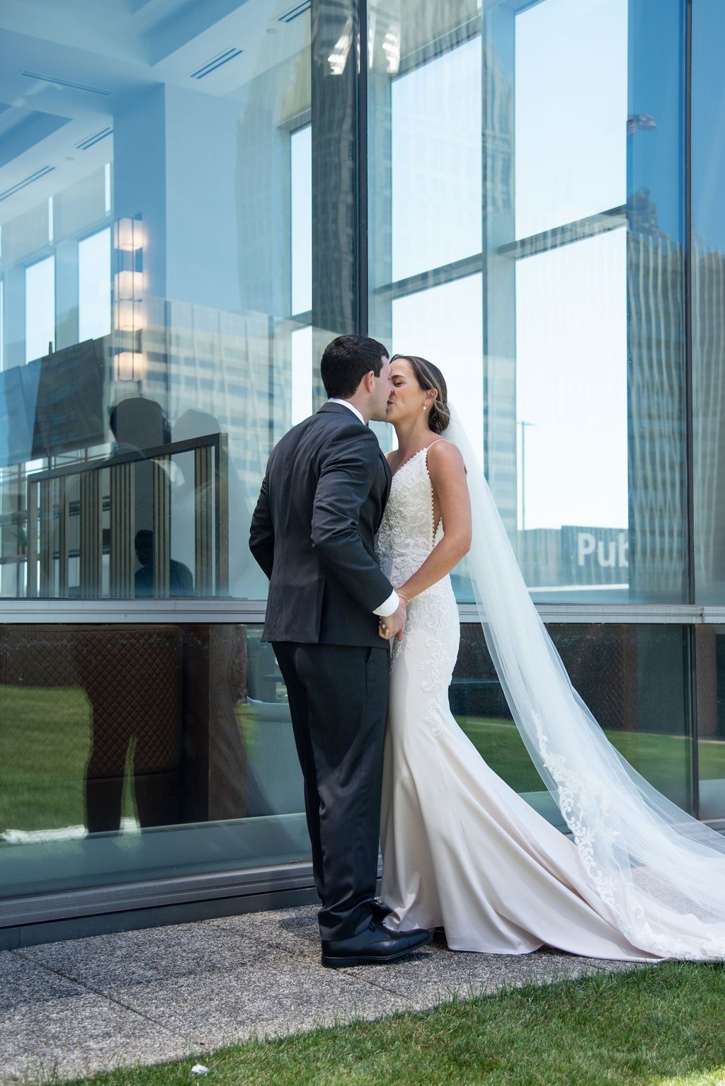 Bride and Groom Kissing on Rooftop