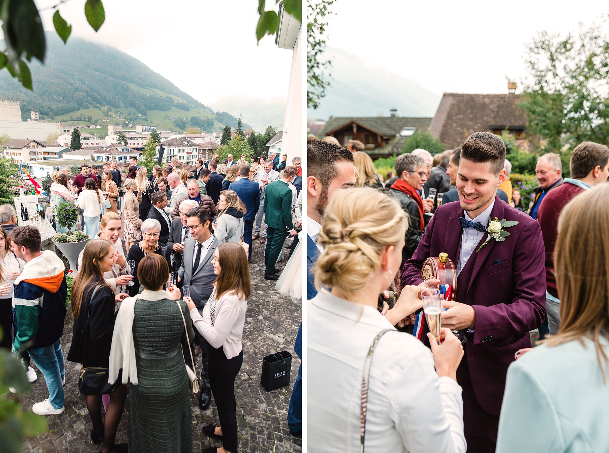 Wide shot of a crowded outdoor wedding reception with guests mingling in a scenic mountain village.