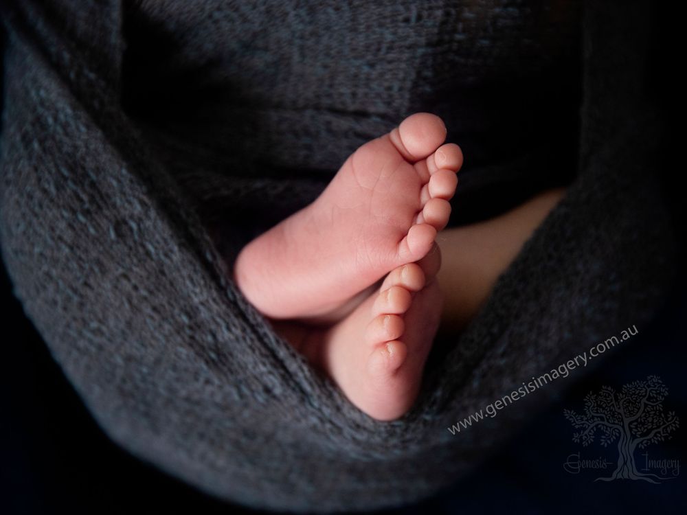 Macro photography of newborn toes and fingers by a Gold Coast specialist.