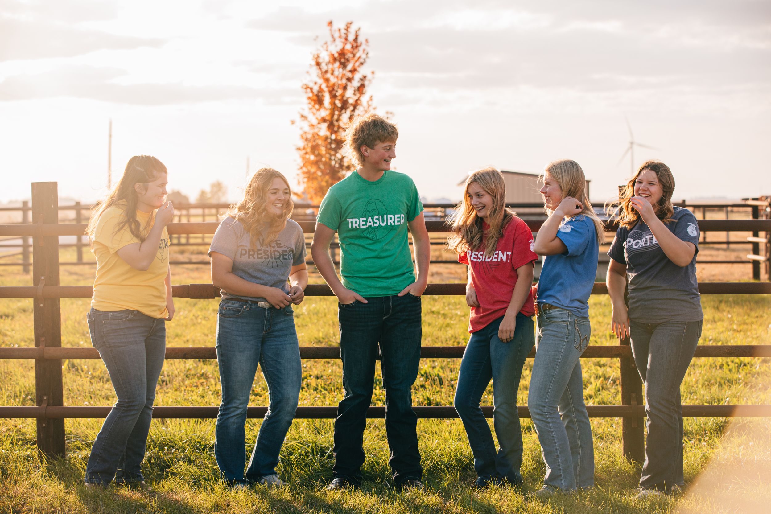 FFA Officers posing on fence