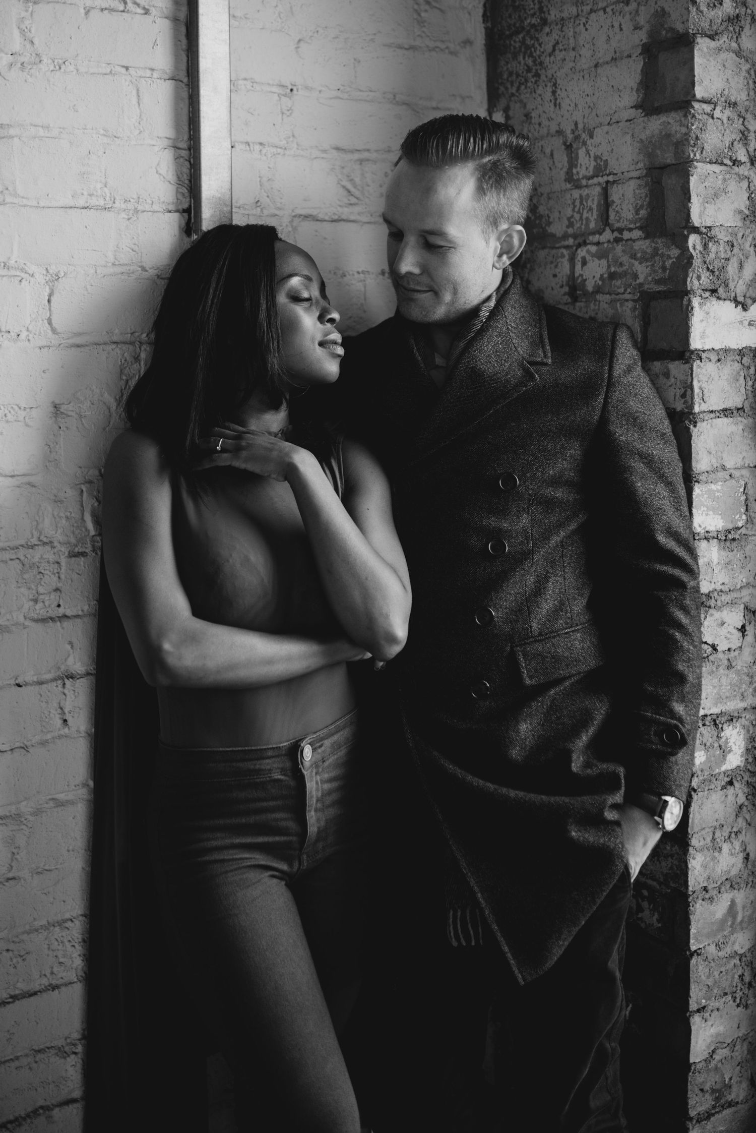 A biracial couple posing in Reffen, Copenhagen