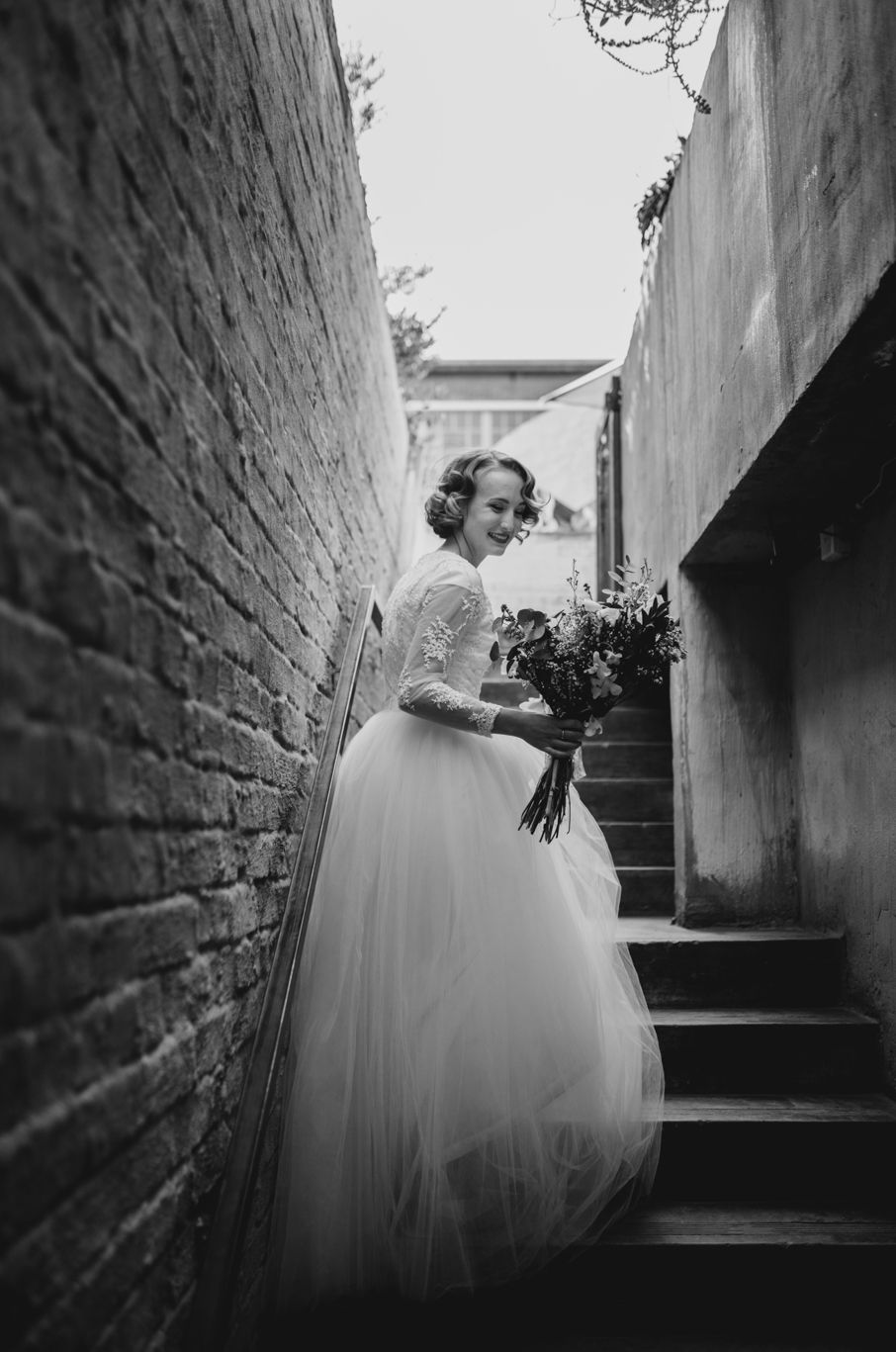 A bride on her wedding day walking around Helenekilde Badehotel in Denmark