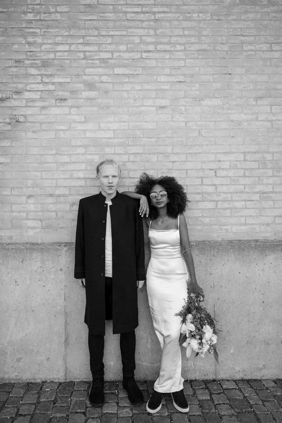 A biracial couple on their wedding day in Copenhagen City Hall